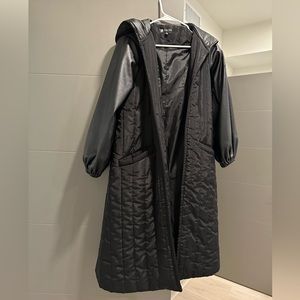 Black jacket with leather sleeves